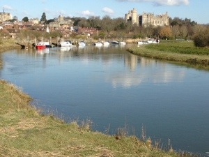 Arundel Castle reflected in the waters of the River Arun