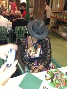 woman with dog in bra