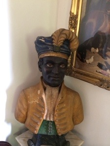 He looks a bit Indian does he not? colonial statue